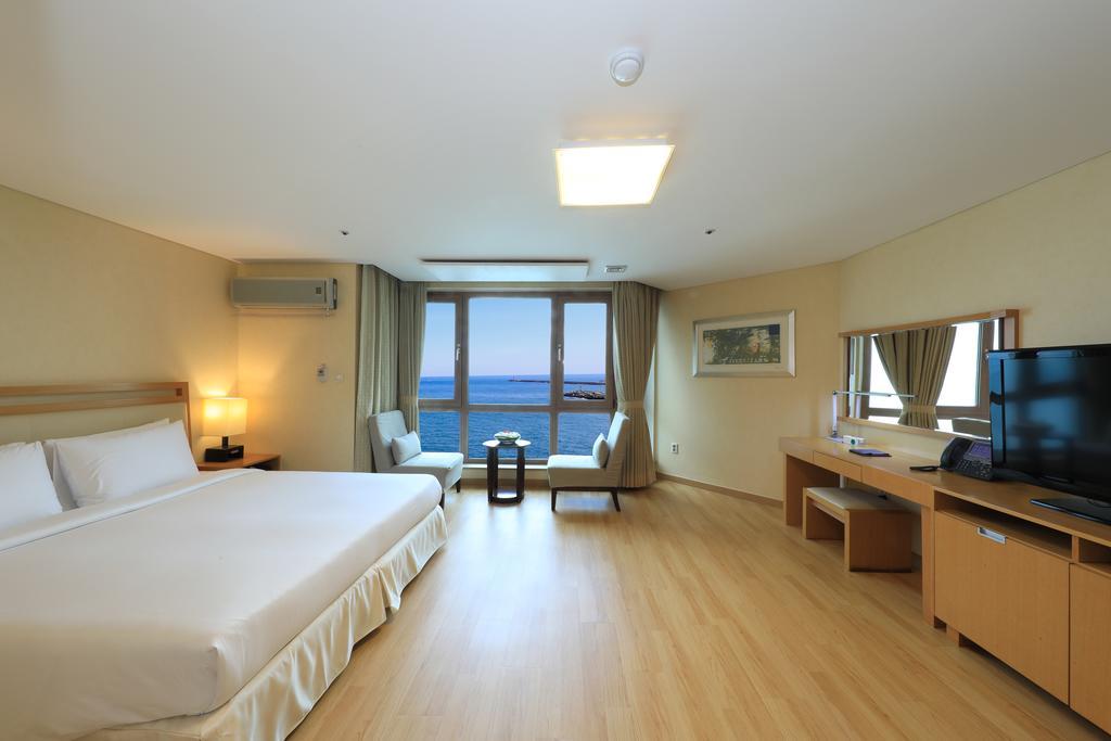 Ocean Suites Jeju Hotel Værelse billede
